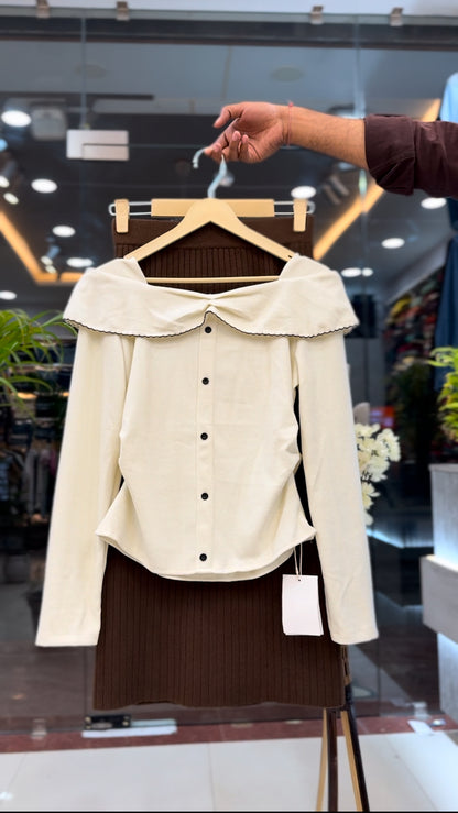 Ribbed slit skirt paired with a scalloped off-shoulder top